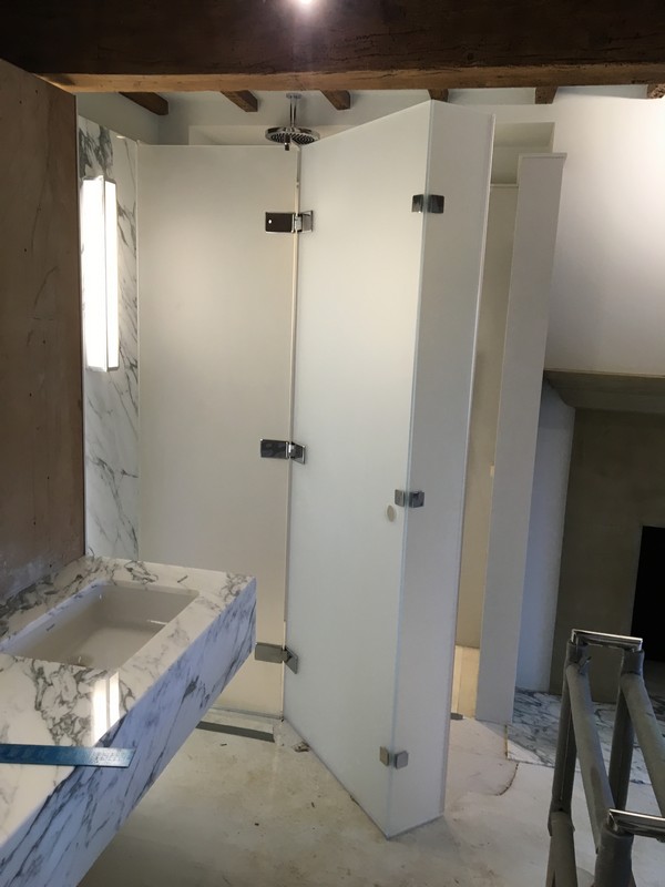 Bespoke frosted glass shower enclosure in Chelsea luxury bathroom