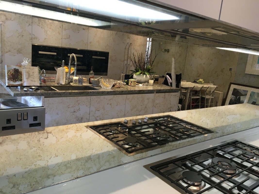 Mirror glass splashback in Chelsea luxury kitchen